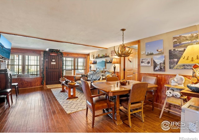 2238 Eagle Cliff Rd, Estes Park, CO 80517 - dining room with wood-type flooring and wooden walls