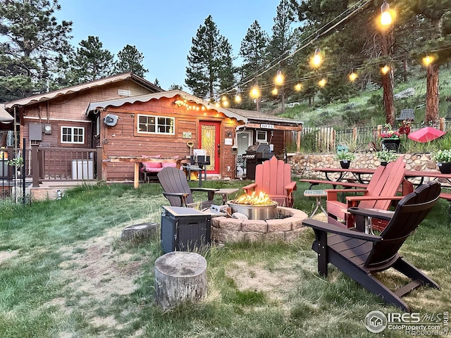 2238 Eagle Cliff Rd, Estes Park, CO 80517 - back of property with an outdoor fire pit