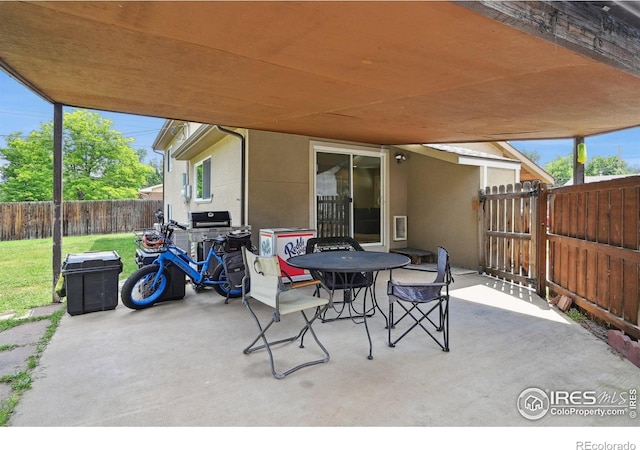 4655 Macky Way, Boulder, CO 80305 - fenced backyard featuring a patio area and outdoor dining area