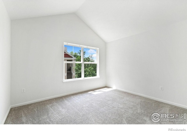 3350 Boulder Cir Unit 201, Broomfield, CO 80023 - carpeted spare room with lofted ceiling and baseboards