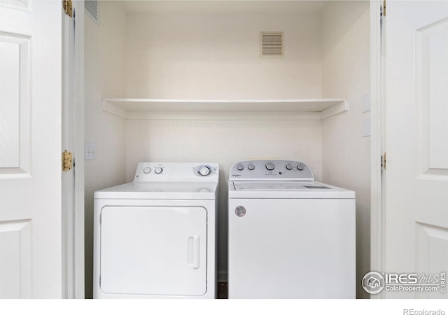 3350 Boulder Cir Unit 201, Broomfield, CO 80023 - washroom featuring separate washer and dryer