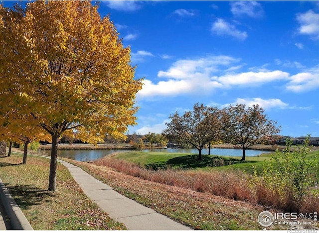 3350 Boulder Cir Unit 201, Broomfield, CO 80023 - view of property's community with a water view and a yard