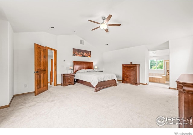 502 Peregrine Cir, Longmont, CO 80504 - bedroom with vaulted ceiling, carpet floors, ensuite bath, and ceiling fan
