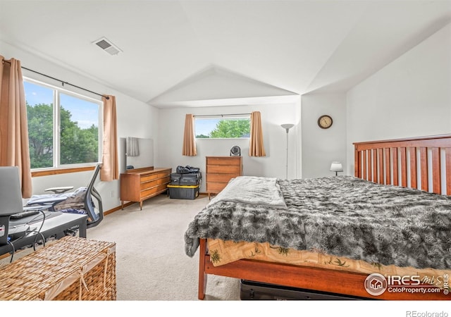 502 Peregrine Cir, Longmont, CO 80504 - carpeted bedroom featuring vaulted ceiling and baseboards