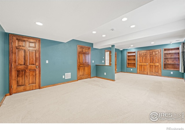 502 Peregrine Cir, Longmont, CO 80504 - unfurnished living room with recessed lighting and carpet