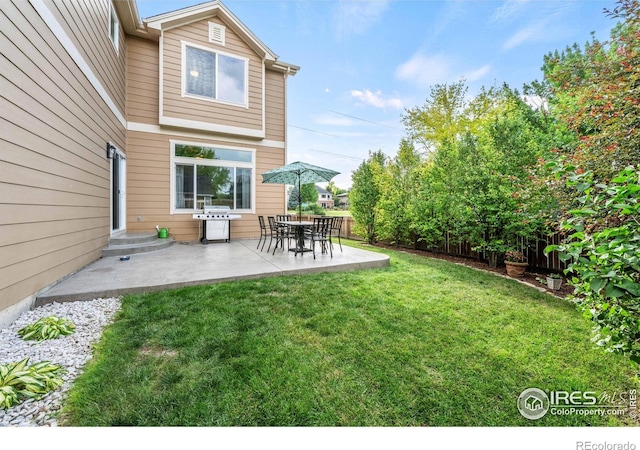502 Peregrine Cir, Longmont, CO 80504 - view of yard with a patio