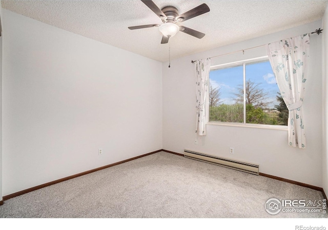 37416 County Road 45, Eaton, CO 80615 - carpeted spare room with a baseboard radiator, ceiling fan, and a textured ceiling