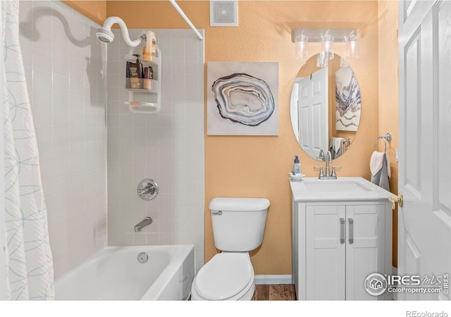 1703 Whitehall Dr Unit G, Longmont, CO 80504 - bathroom featuring vanity and shower / bath combo with shower curtain