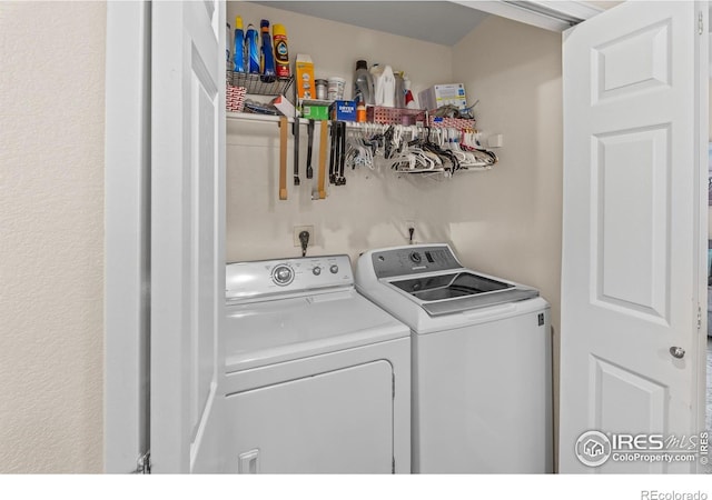 1703 Whitehall Dr Unit G, Longmont, CO 80504 - washroom featuring washer and clothes dryer