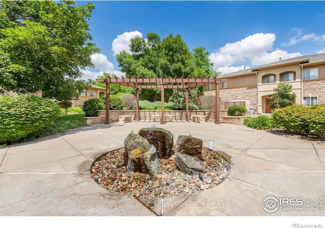 1703 Whitehall Dr Unit G, Longmont, CO 80504 - surrounding community with a pergola