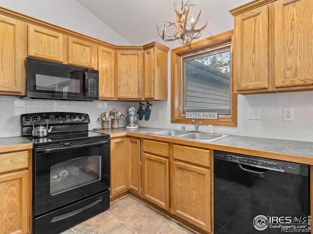 1316 Kinnikinnic Ct, Estes Park, CO 80517 - kitchen featuring black appliances, lofted ceiling, backsplash, and a chandelier
