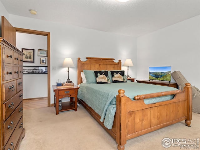 1316 Kinnikinnic Ct, Estes Park, CO 80517 - bedroom with light colored carpet and baseboards