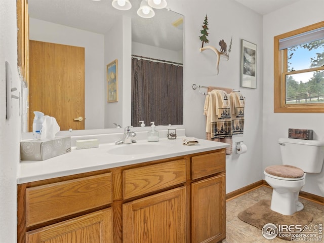 1316 Kinnikinnic Ct, Estes Park, CO 80517 - bathroom featuring vanity and toilet