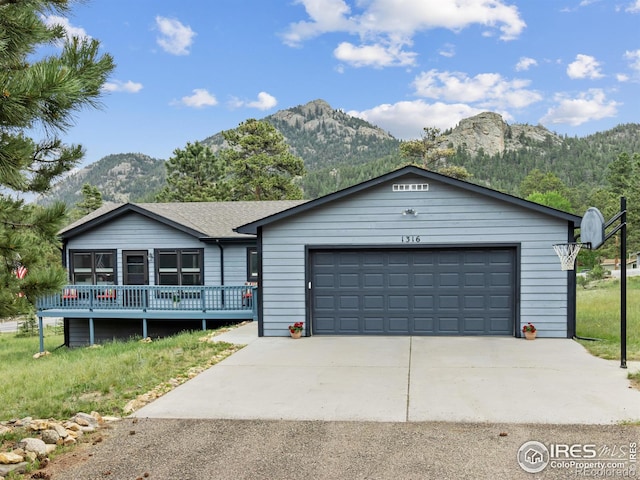 1316 Kinnikinnic Ct, Estes Park, CO 80517 - single story home featuring a mountain view