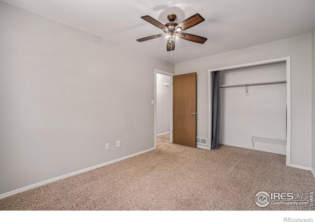 1634 San Juan Cir, Evans, CO 80620 - unfurnished bedroom with carpet flooring, a closet, and ceiling fan
