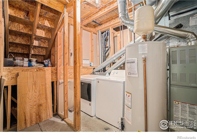 1634 San Juan Cir, Evans, CO 80620 - laundry area featuring gas water heater, separate washer and dryer, and heating unit