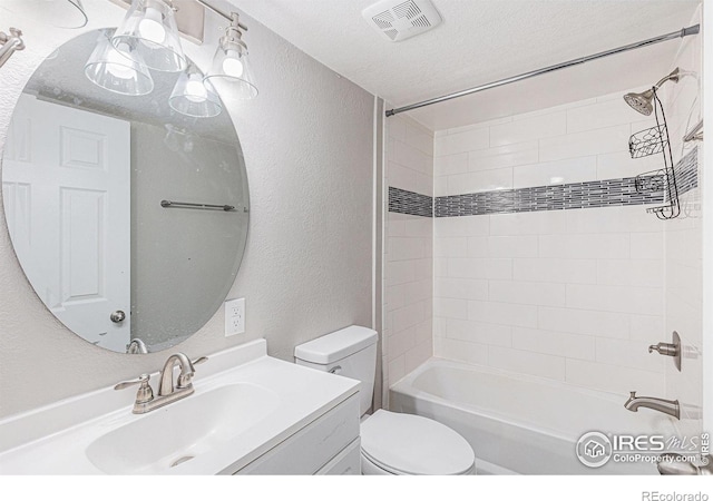 8416 Peakview Dr, Fort Collins, CO 80528 - bathroom with a textured wall, vanity, bathtub / shower combination, and a textured ceiling