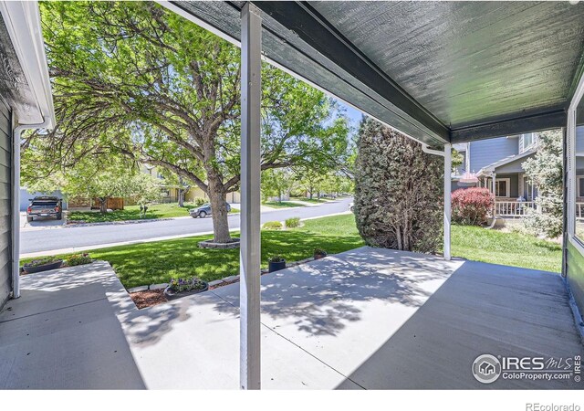 5491 E 117th Ave, Thornton, CO 80233 - porch with a yard