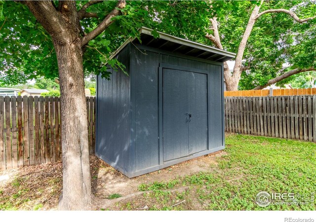 8696 W 86th Cir, Arvada, CO 80005 - view of shed with a fenced backyard
