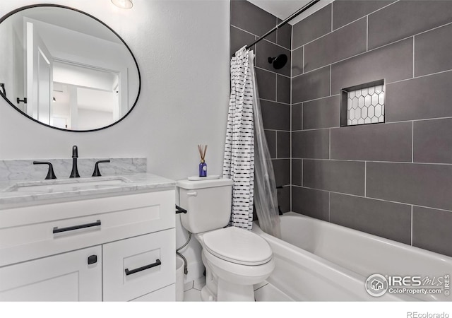 8696 W 86th Cir, Arvada, CO 80005 - bathroom featuring vanity and shower / bath combo with shower curtain