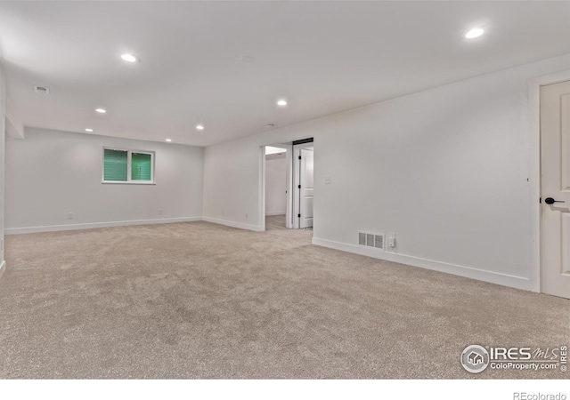8696 W 86th Cir, Arvada, CO 80005 - spare room featuring light carpet and recessed lighting