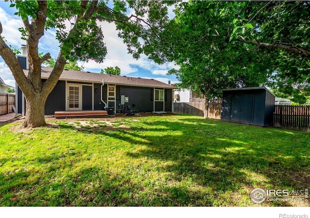 8696 W 86th Cir, Arvada, CO 80005 - back of property featuring a fenced backyard and a shed