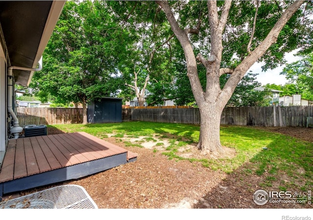 8696 W 86th Cir, Arvada, CO 80005 - fenced backyard with a storage shed and a wooden deck