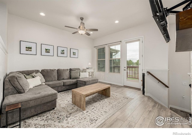 619 Brennan Cir, Erie, CO 80516 - living room with light wood-type flooring, a ceiling fan, and recessed lighting