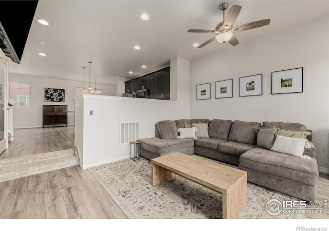 619 Brennan Cir, Erie, CO 80516 - living room featuring recessed lighting, a ceiling fan, and light wood-type flooring