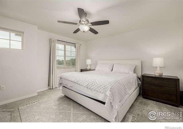 619 Brennan Cir, Erie, CO 80516 - bedroom featuring multiple windows, light carpet, and ceiling fan