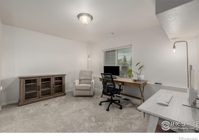 619 Brennan Cir, Erie, CO 80516 - carpeted office space featuring baseboards and a textured ceiling