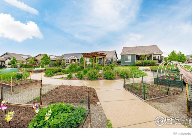 619 Brennan Cir, Erie, CO 80516 - view of home's community with a vegetable garden, a pergola, and a residential view