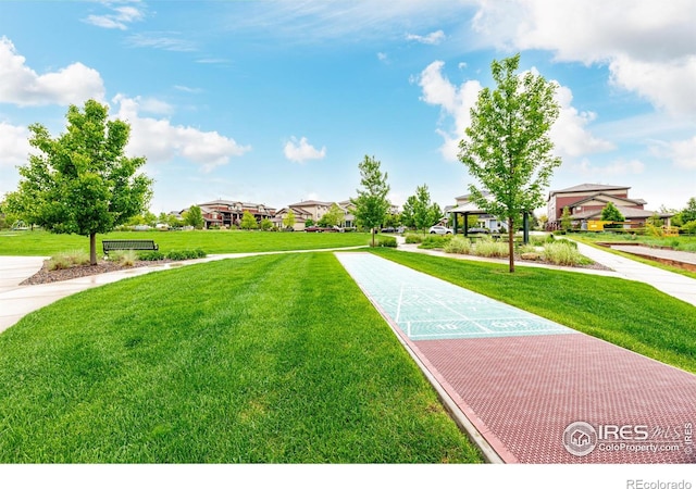 619 Brennan Cir, Erie, CO 80516 - view of community featuring shuffleboard, a lawn, and a residential view