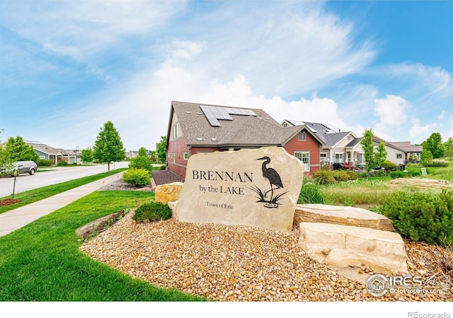 619 Brennan Cir, Erie, CO 80516 - community sign with a residential view and a yard