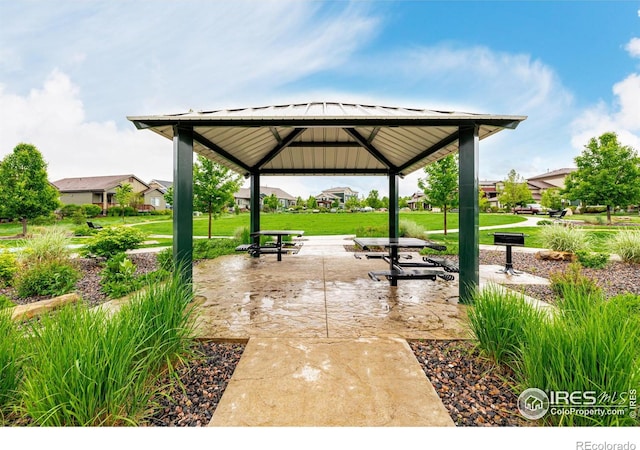 619 Brennan Cir, Erie, CO 80516 - surrounding community featuring a gazebo and a lawn