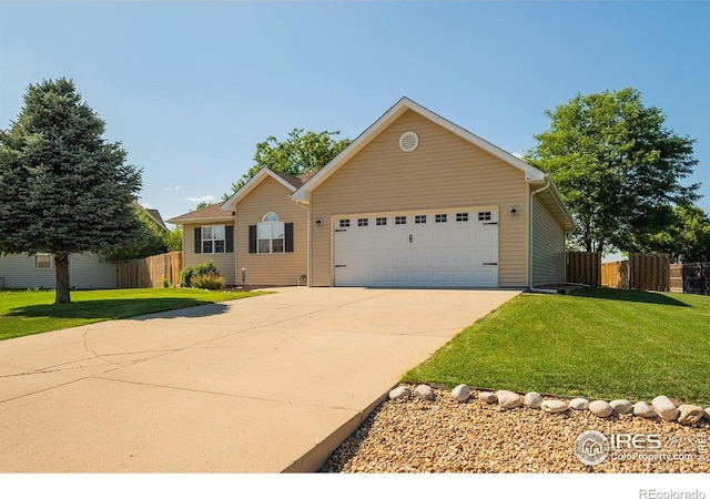 14053 Cottonwood Cir, Sterling, CO 80751 - single story home with an attached garage and driveway