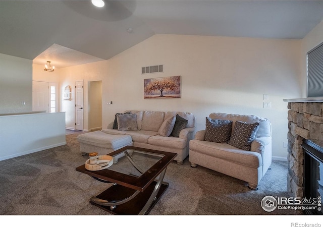 14053 Cottonwood Cir, Sterling, CO 80751 - living room with carpet, vaulted ceiling, a fireplace, and ceiling fan
