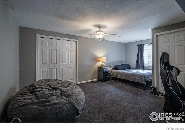 14053 Cottonwood Cir, Sterling, CO 80751 - bedroom with dark colored carpet, ceiling fan, a closet, and a textured ceiling
