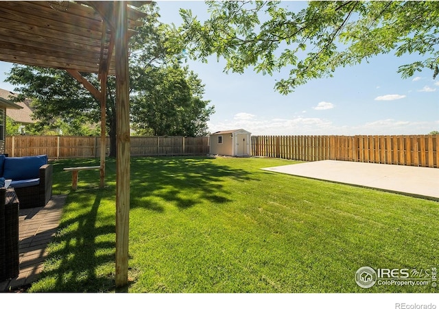 14053 Cottonwood Cir, Sterling, CO 80751 - fenced backyard with a shed and a patio area