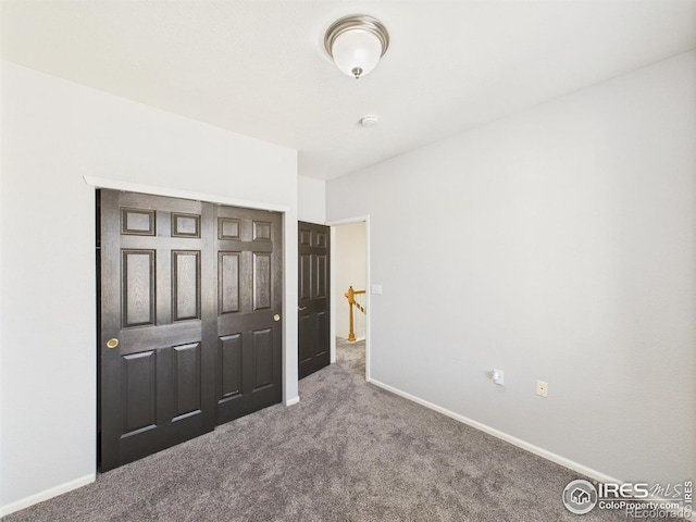 12912 Grant Cir E # A, Thornton, CO 80241 - unfurnished bedroom with carpet floors and baseboards