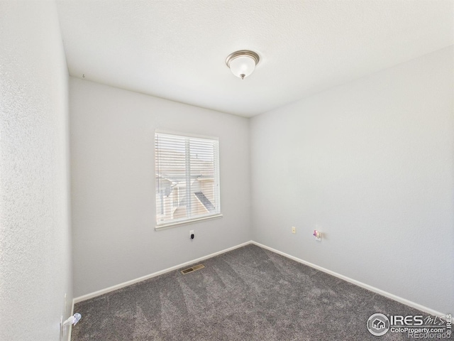 12912 Grant Cir E # A, Thornton, CO 80241 - carpeted spare room featuring baseboards
