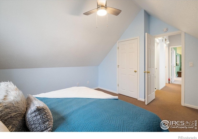 1605 17th St, Boulder, CO 80302 - carpeted bedroom with vaulted ceiling and a ceiling fan