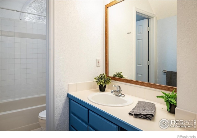 1605 17th St, Boulder, CO 80302 - full bath with vanity, a textured wall, and bathtub / shower combination