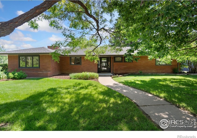 600 Monte Vista Ave, Fort Collins, CO 80521 - single story home with brick siding and a front lawn