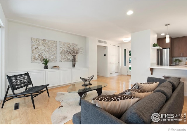 600 Monte Vista Ave, Fort Collins, CO 80521 - living room with light wood-type flooring and recessed lighting