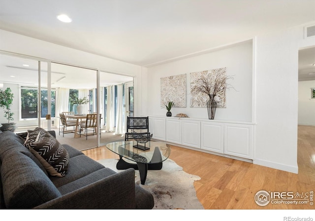 600 Monte Vista Ave, Fort Collins, CO 80521 - living area featuring light wood finished floors and recessed lighting