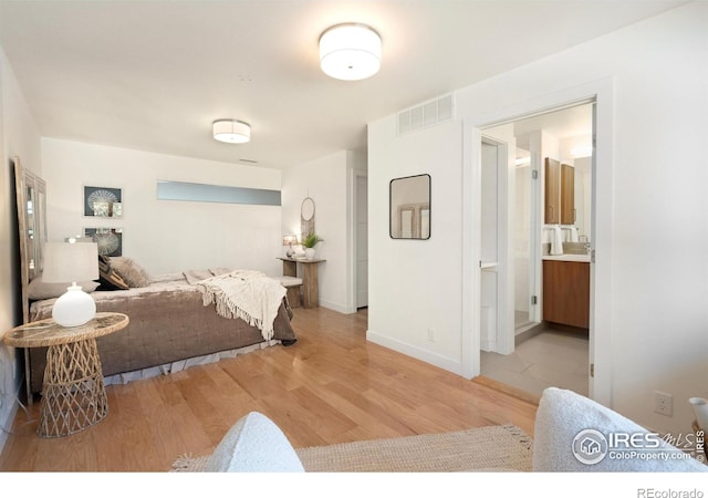 600 Monte Vista Ave, Fort Collins, CO 80521 - bedroom featuring wood finished floors and ensuite bath
