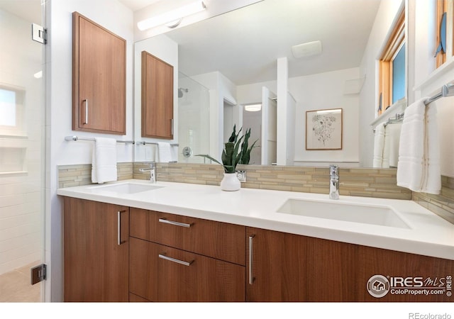 600 Monte Vista Ave, Fort Collins, CO 80521 - bathroom with double vanity, decorative backsplash, and a shower stall