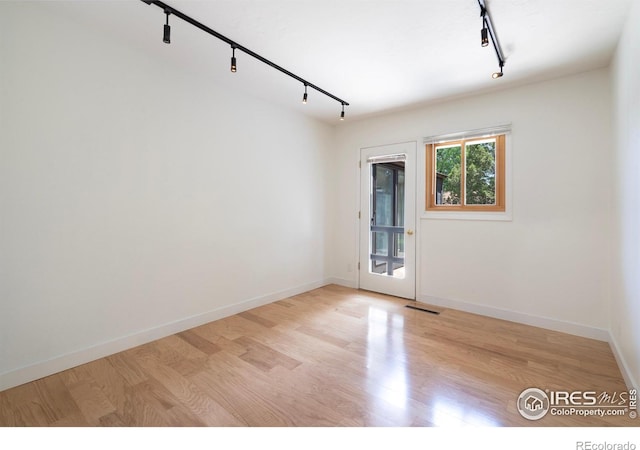 600 Monte Vista Ave, Fort Collins, CO 80521 - spare room featuring rail lighting and light wood finished floors