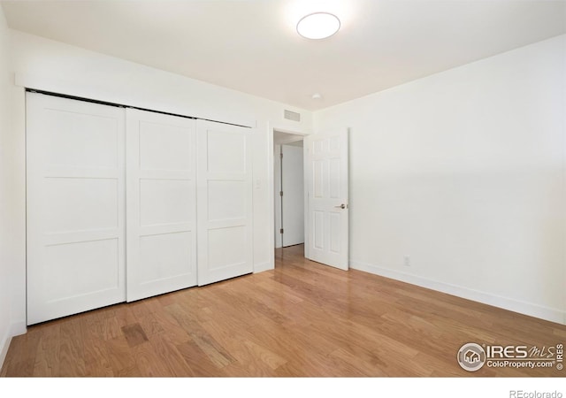 600 Monte Vista Ave, Fort Collins, CO 80521 - unfurnished bedroom featuring wood finished floors and a closet